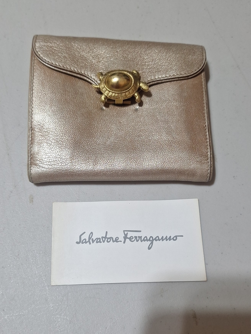 Salvatore Ferragamo Metallic Champagne Leather Wallet with Turtle Clasp